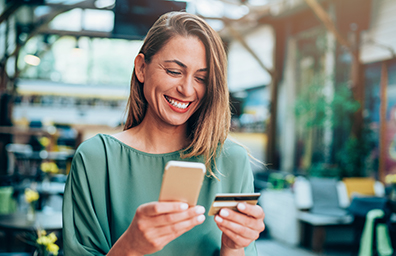 Woman makes payment using phone