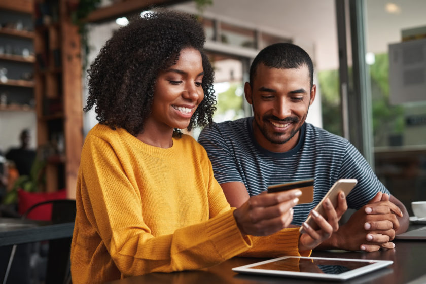 Couple using a credit card online